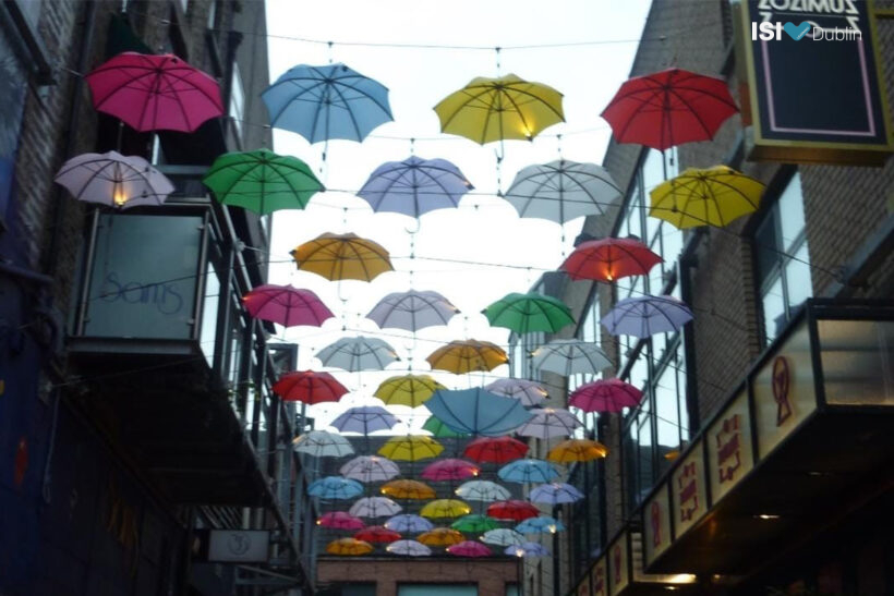 Carolina Mann (5th year at Manor House) walking on Dublin’s Anne Street under the multi-coloured umbrellas