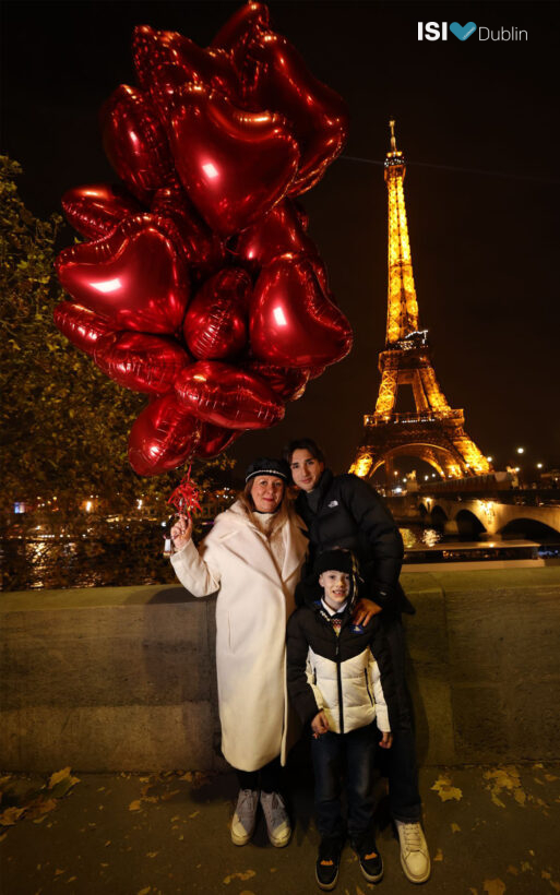 Alfredo and his host family at the Eiffel Tower