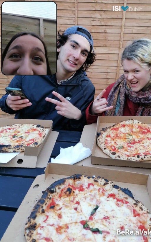 Alessia, Daniele and Malwine eating pizza