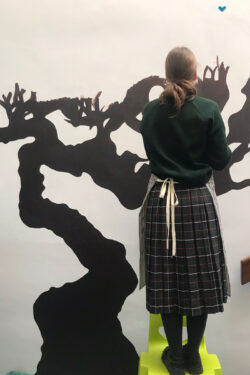 Paulina Vocke Painting a Tree in St Marys Baldoyle for Creative Week