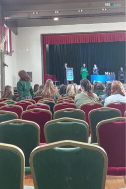 Clara Sturm and Marisol Wiest Collecting Their Certificates